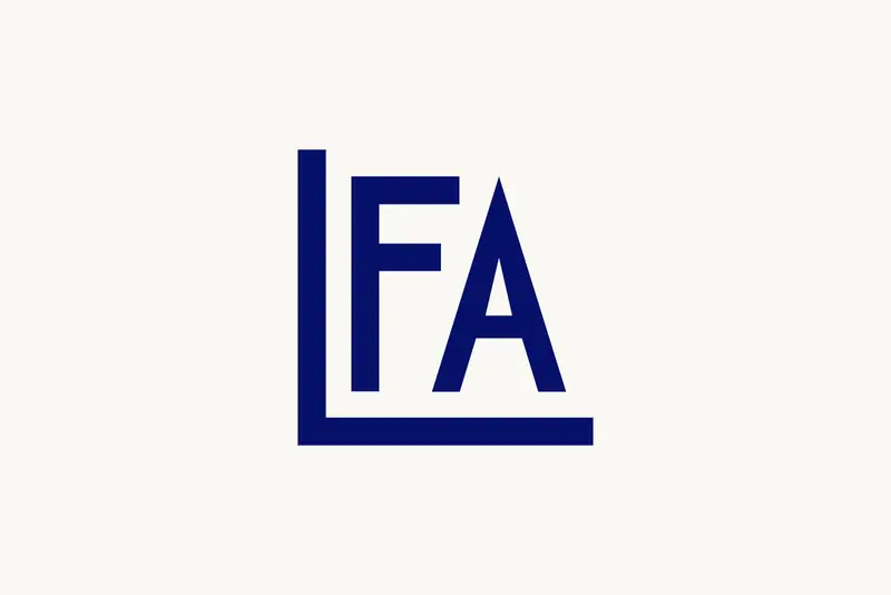 The LFA monogram in navy, three interlocking geometric letters
